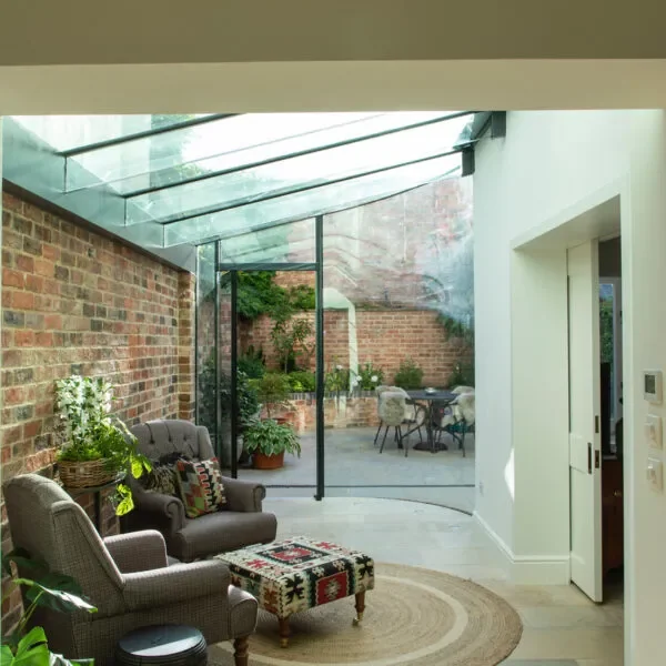 Armchairs beneath the glass roof at Lansdown Crescent, looking onto the courtyard