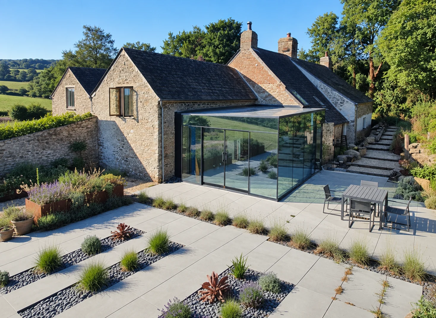 Elevated view of Thorn Farm showing the glazed addition and landscaped terrace