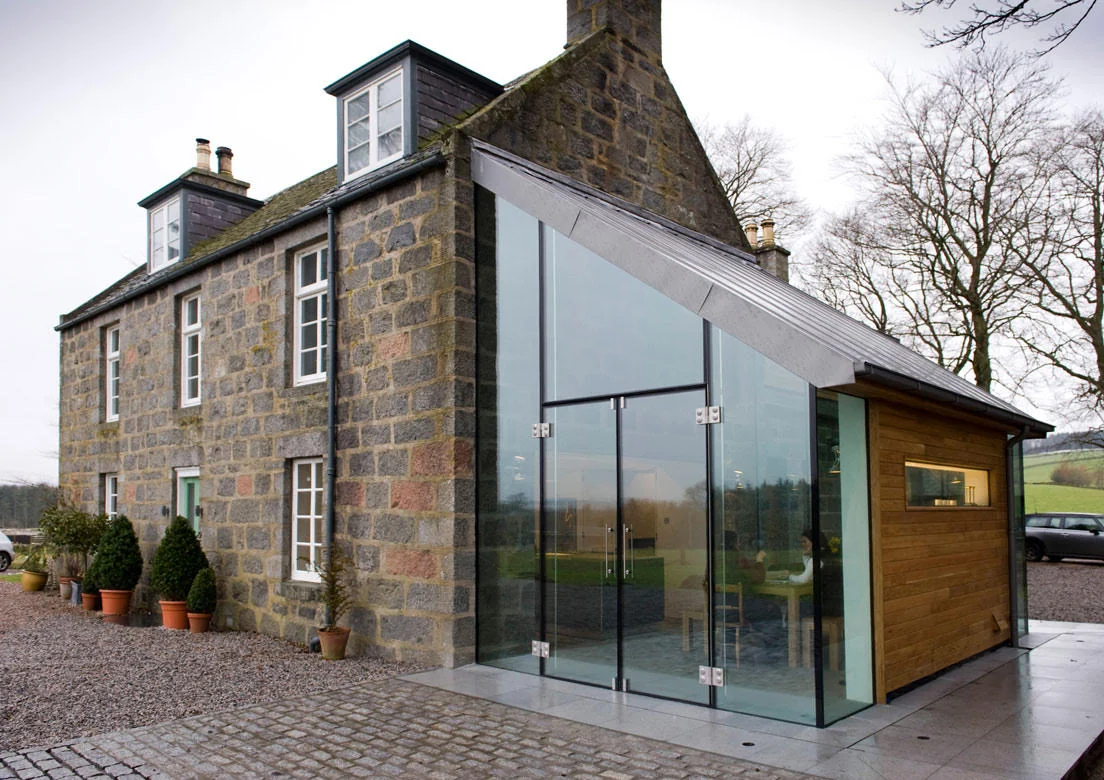Full-height glass facade at Highland Retreat