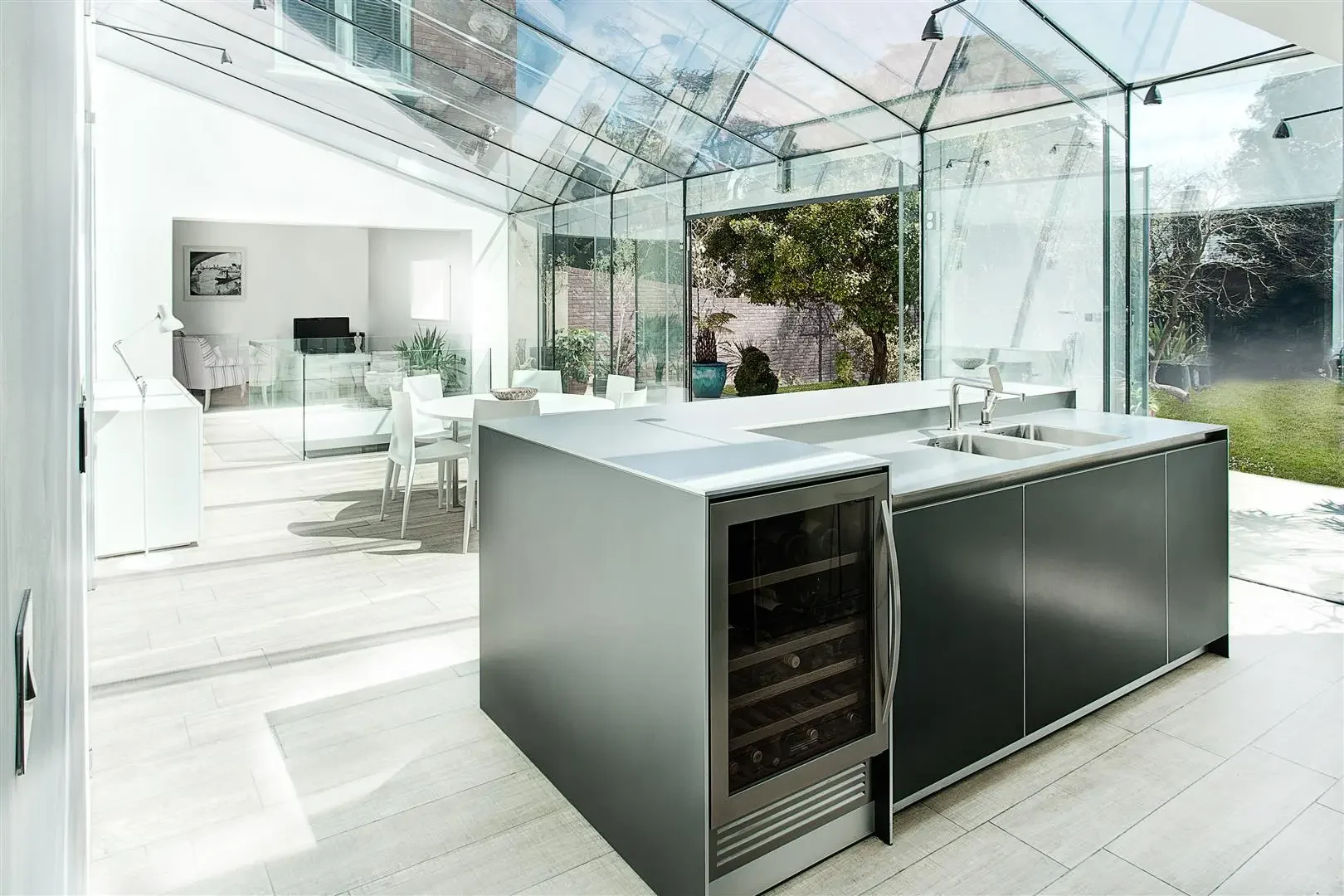 Glass roof and walls bringing daylight into the Old Manor House kitchen