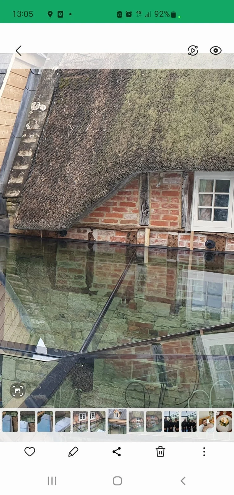 Home Farm glass roof and thatched farmhouse detail, supplied as a phone screenshot