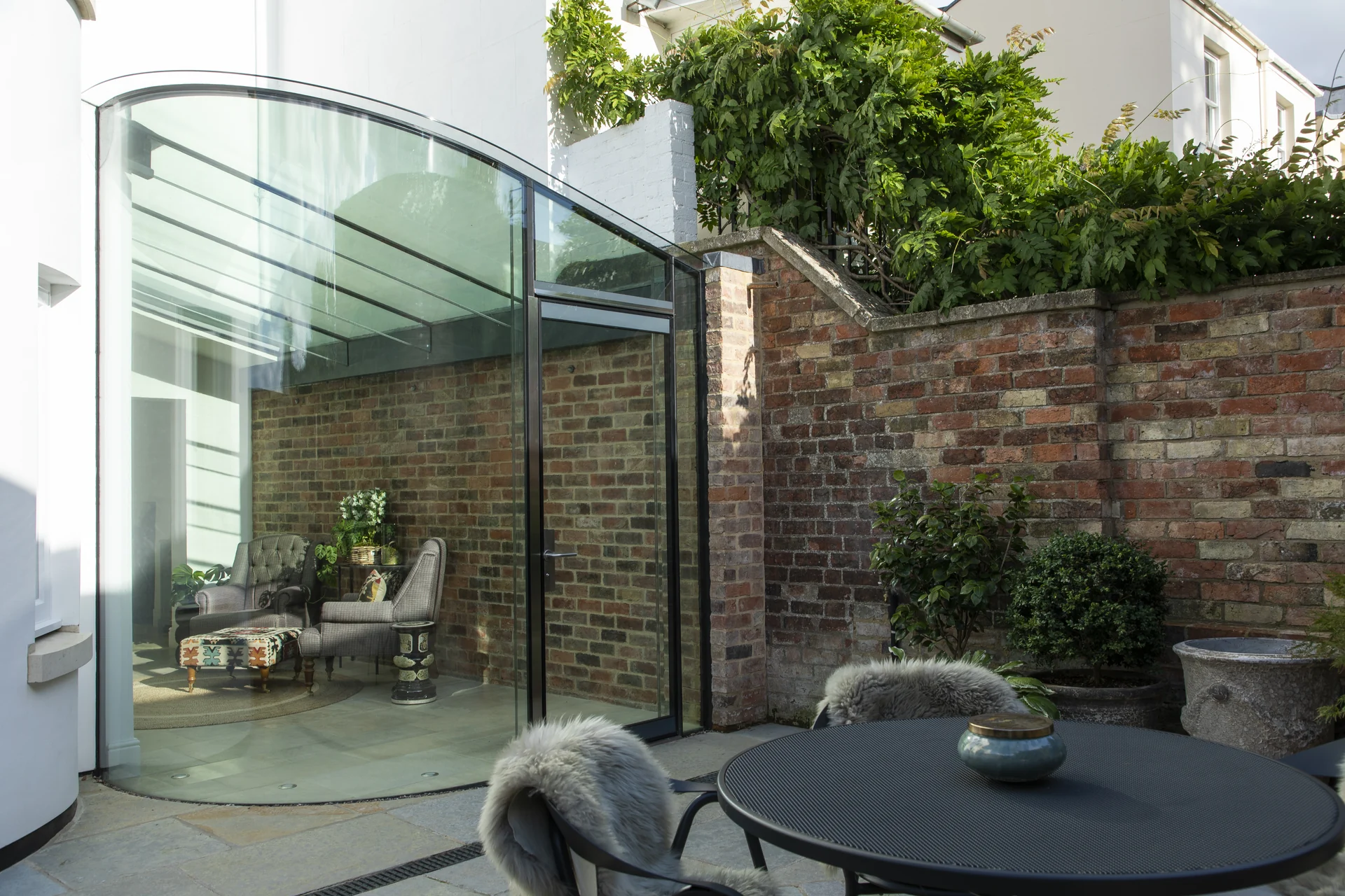 Lansdown Crescent glass extension viewed from the courtyard dining table