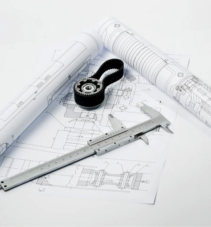 Vernier caliper and rolled technical drawings