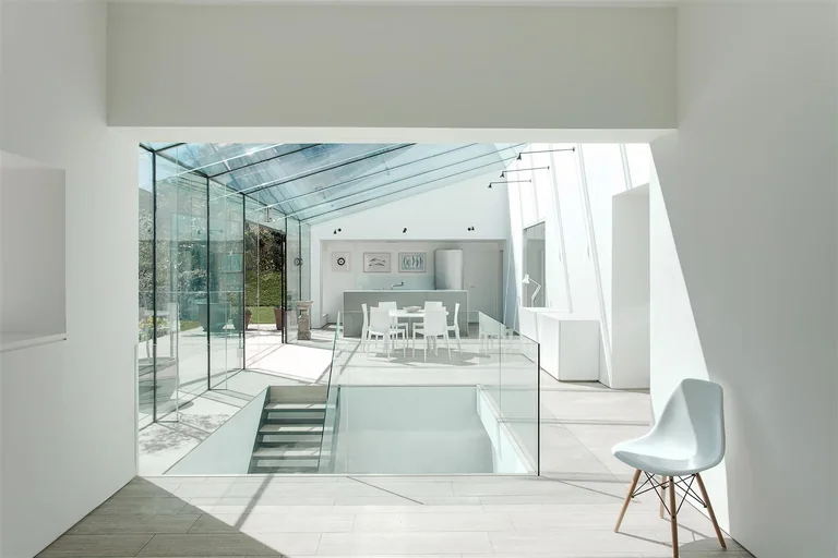 Winchester kitchen and dining space with a frameless glass extension