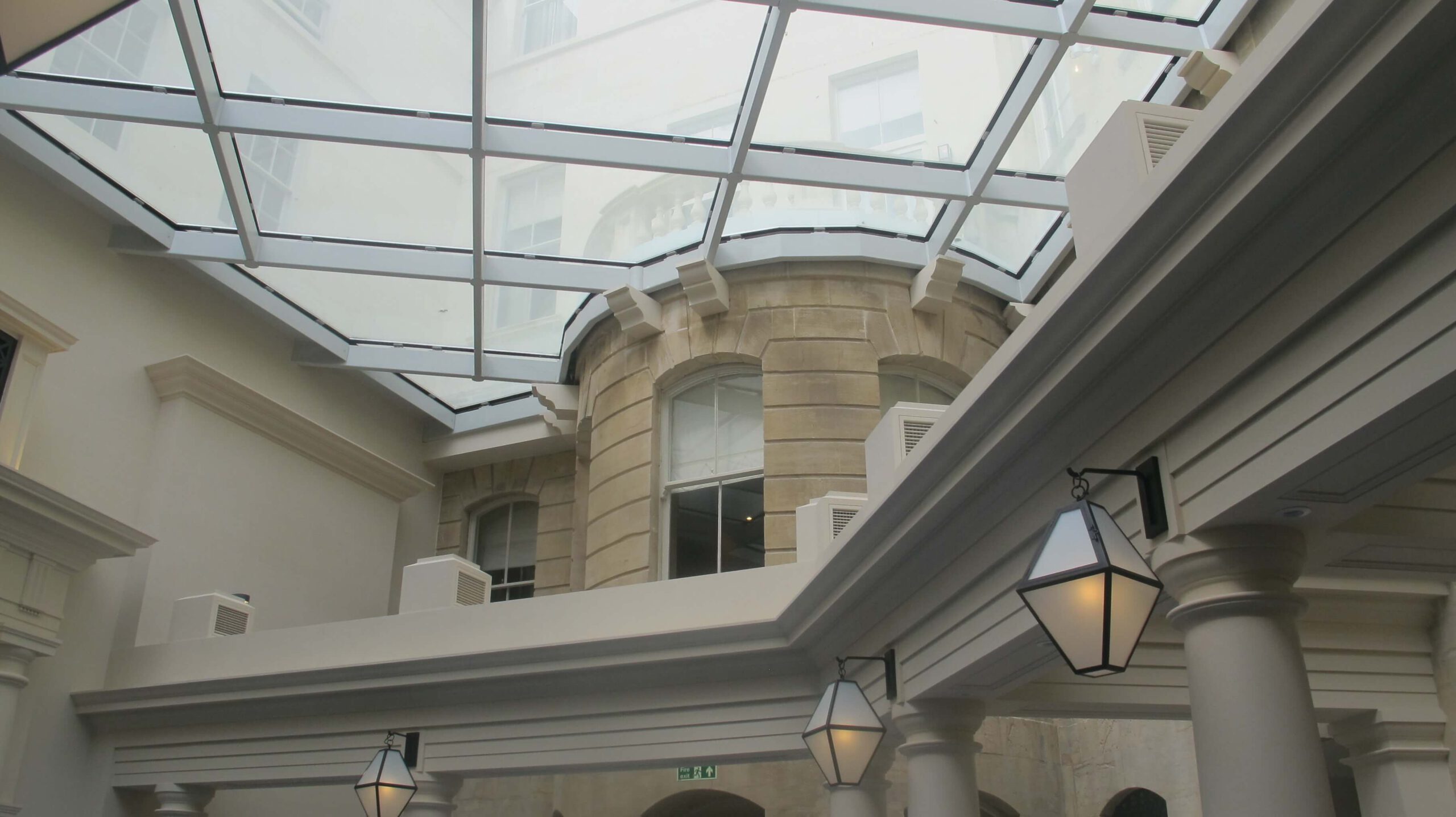 A lobby with a glass roof
